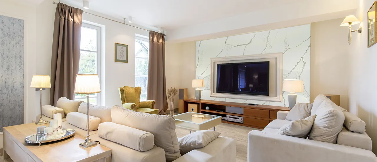 New Calacatta Laza Gold Quartz Slab as Accent Wall in Living Room