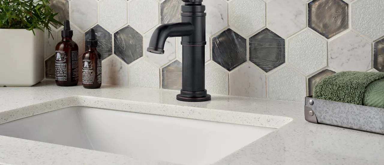 Sparkling White Quartz Countertop in Bathroom Sink
